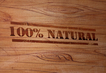 Natural 100 Percent Stamp on a Wooden Surface