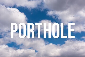 PORTHOLE - word on the background of the sky with clouds.