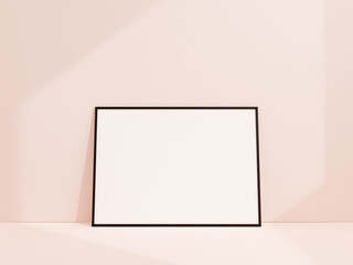 Clean and minimalist front view landscape black photo or poster frame mockup leaning against white wall. 3d rendering.