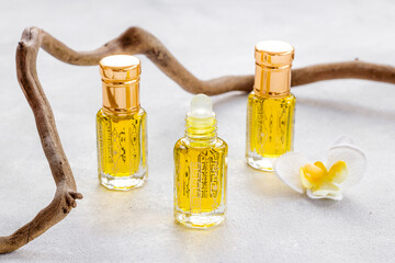 Bottles of agarwood tree oil perfume, close up. Traditional Arabian fragrance