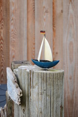 Fototapeta na wymiar little wooden boat on wood