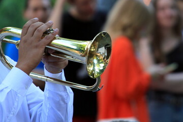 Charity concert to help the armed forces of Ukraine. A musician plays the trumpet