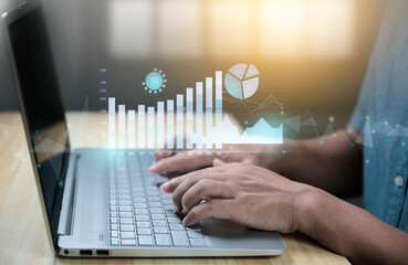 Analysts who work with Business Analytics and Data Management System on a computer to produce reports with KPIs and metrics connected to corporate strategy databases for Finance, Operations, Sales, 