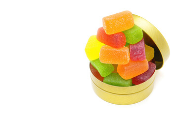Mix of fruit jelly candies in a round tin box