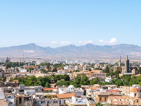 North Nicosia seen from South Nicosia with massive Turkish symbols visible on the hills (Cyprus) - Vertical