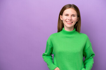 Young English woman isolated on purple background laughing