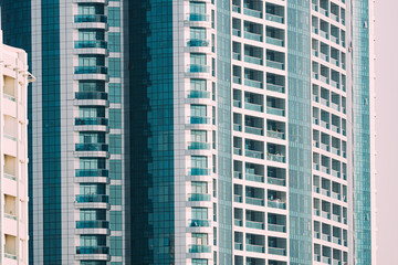 Wall With A Balcony Of New Empty Modern Multi-storey Residential Building House In Residential Area. Close Up.