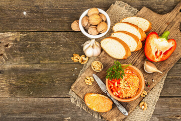 Traditional Middle Eastern dip Muhammara. Roasted red bell pepper with walnuts and spices