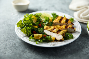 Healthy salad with grilled chicken
