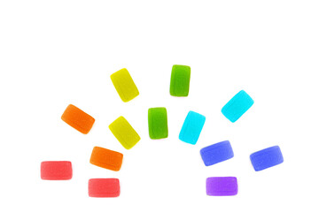 Rainbow shape made from jelly candies on white