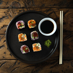 Assorted vegan sushi rolls with vegetables and tofu