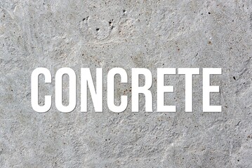 CONCRETE - word on concrete background. Cement floor, wall.
