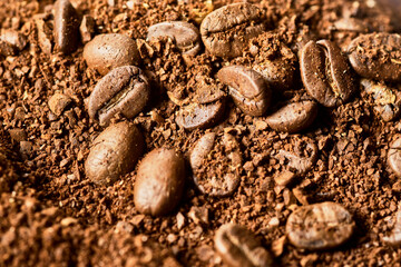 Ground coffee and coffee beans.