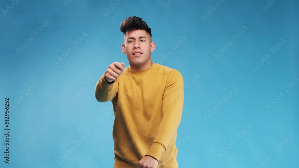 Poster happy and cheerful man enjoying while dancing against an isolated background.