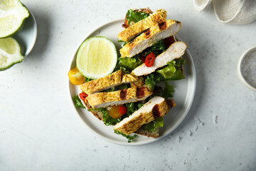 Grilled chicken sandwich with kale