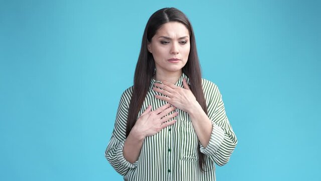 Woman having panic attack can't breathe in touch her neck throat