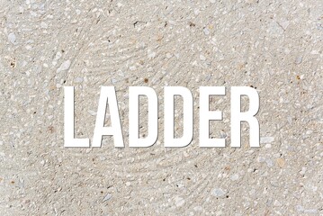 LADDER - word on concrete background. Cement floor, wall.