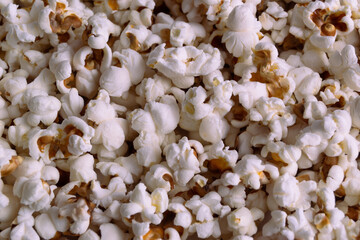 Popcorn texture background. Close-up Tasty salted popcorn