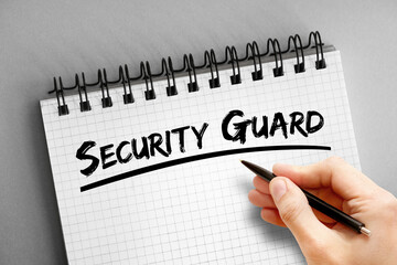 Security guard text on notepad, concept background