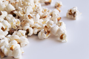 Fresh popcorn with copy space on the white background.
