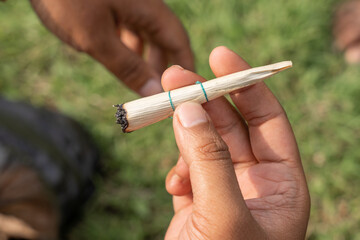 Traditional cigarette wrapped by corn leaf