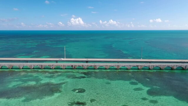 Aerial View Of Seven Mile Bridge In Florida Keys. Endless Road In Monroe County, Florida, USA. sideways shot