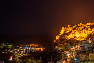 Aerial panoramic view over Chora, Kythira and the Castle in Kythira island, Greece at night