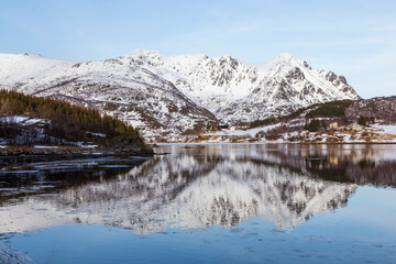 Fototapeta na wymiar Mountain reflection in lake at Vestvagoy. Lofoten Islands. Norway