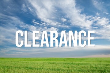 CLEARANCE - word on the background of the sky with clouds.