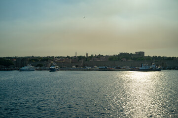 Fototapeta premium Island view coast Rhodos sunset port