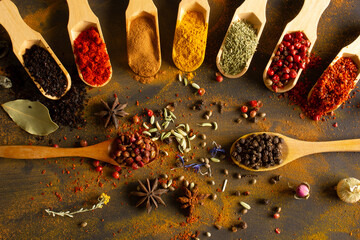 Colorful background from various spices in spoon © Kybele