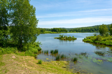 Naklejka na ściany i meble Picturesque pond on the Suenga river in Novosibirsk region