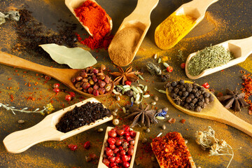 Colorful background from various spices in spoon © Kybele