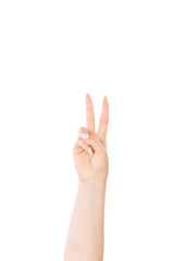 Woman`s hand with two fingers up in the peace or victory symbol