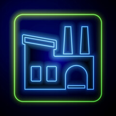 Glowing neon Factory icon isolated on blue background. Industrial building. Vector