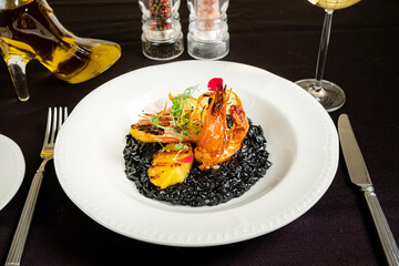 black rice with shrimps and lemon