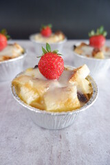 Homemade strawberry shortcake. Strawberry Shortcake Individual Serving Portion on a wooden cutting board. selective focus. close up