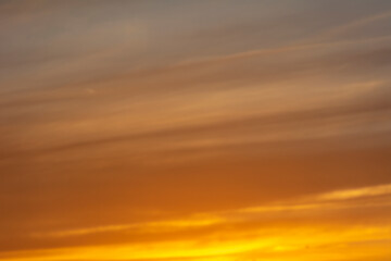 Fototapeta premium The setting sun in a colored sky.
