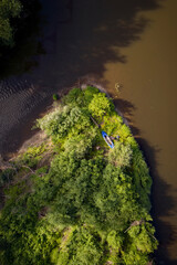 Aerial view of an isolated island on the River Severn in Shropshire with kayak