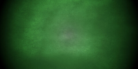 Abstract wall grunge backdrop vintage green splash design background with dark black borders. Green abstract watercolor grunge texture background.