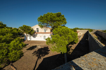 Fototapeta na wymiar edificio de oreo, isla del Lazareto, Illa del Llatzeret, interior del puerto de Mahón, Menorca, balearic islands, Spain