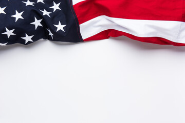 The flag of the United States of America on white background with copy space - Powered by Adobe