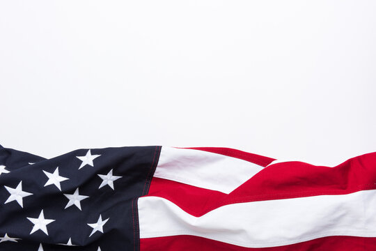 The flag of the United States of America on white background with copy space