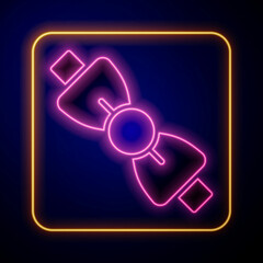 Glowing neon Bow tie icon isolated on black background. Vector