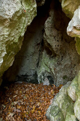 close-up view of the entrance to the cave in the rock