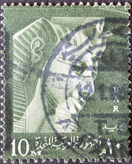 EGYPT - CIRCA 1959: a postage stamp from EGYPT , showing the figure Pharaoh Ramses II, head of a...