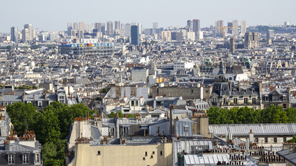 Paris, France. Amazing landscape to the city from the hill of Sacr&eacute;-Coeur. Summer time. view of the buildings and the roof of Paris