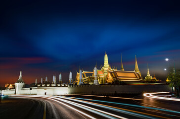 Wat Phra Kaew (The Emerald Buddha Temple) and the Grand Palace scenery twilight at night, Bangkok, Thailand..