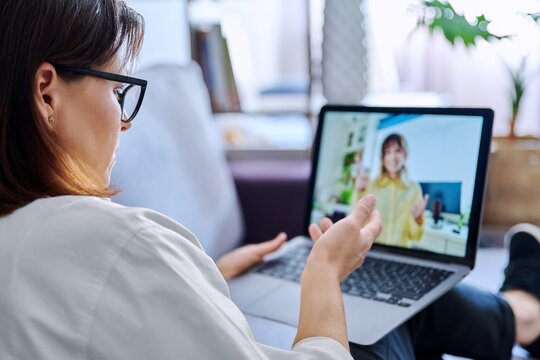 Online Consultation, Female Teacher Talking To Teenage Student