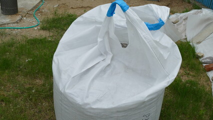 one ton of building rubble in a bag